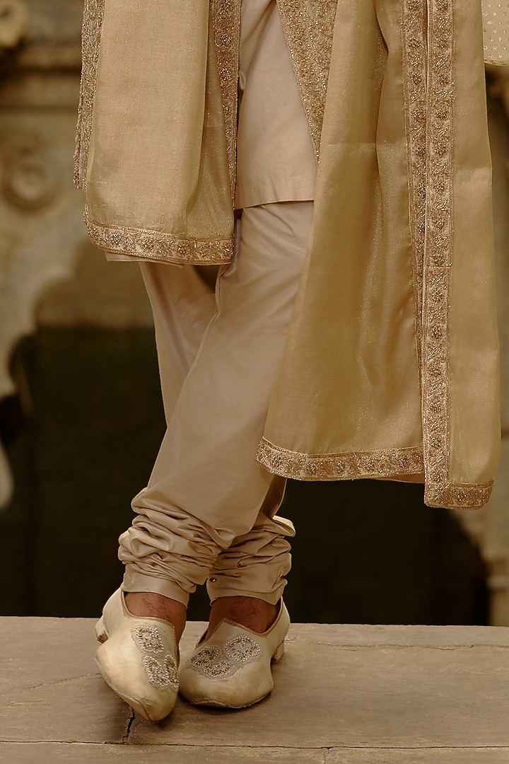 Gold Raw Silk & Tissue Dabka Embroidered Groom Sherwani Set by NITIKA GUJRAL MEN at Pernia's Pop Up Shop