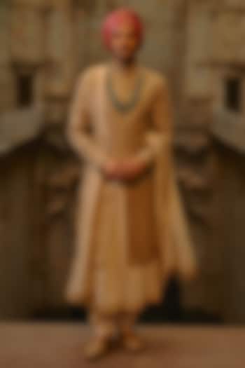 Salmon-Colored Matka Silk Zari Embroidered Sherwani Set by NITIKA GUJRAL MEN