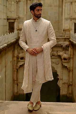 Beige Raw Silk Resham Embroidered Sherwani Set by NITIKA GUJRAL MEN