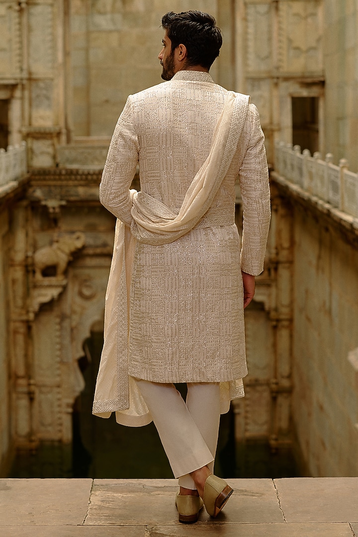 Beige Raw Silk Resham Embroidered Groom Sherwani Set by NITIKA GUJRAL MEN at Pernia's Pop Up Shop