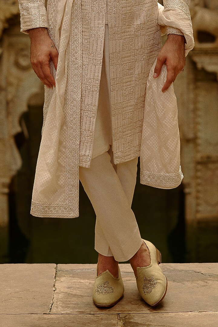 Beige Raw Silk Resham Embroidered Groom Sherwani Set by NITIKA GUJRAL MEN at Pernia's Pop Up Shop