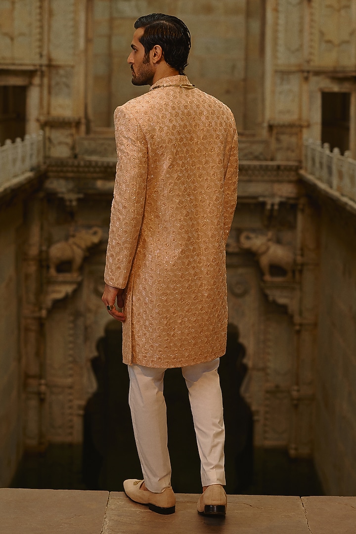 Peach Raw Silk Cutdana Embroidered Groom Sherwani Set by NITIKA GUJRAL MEN at Pernia's Pop Up Shop