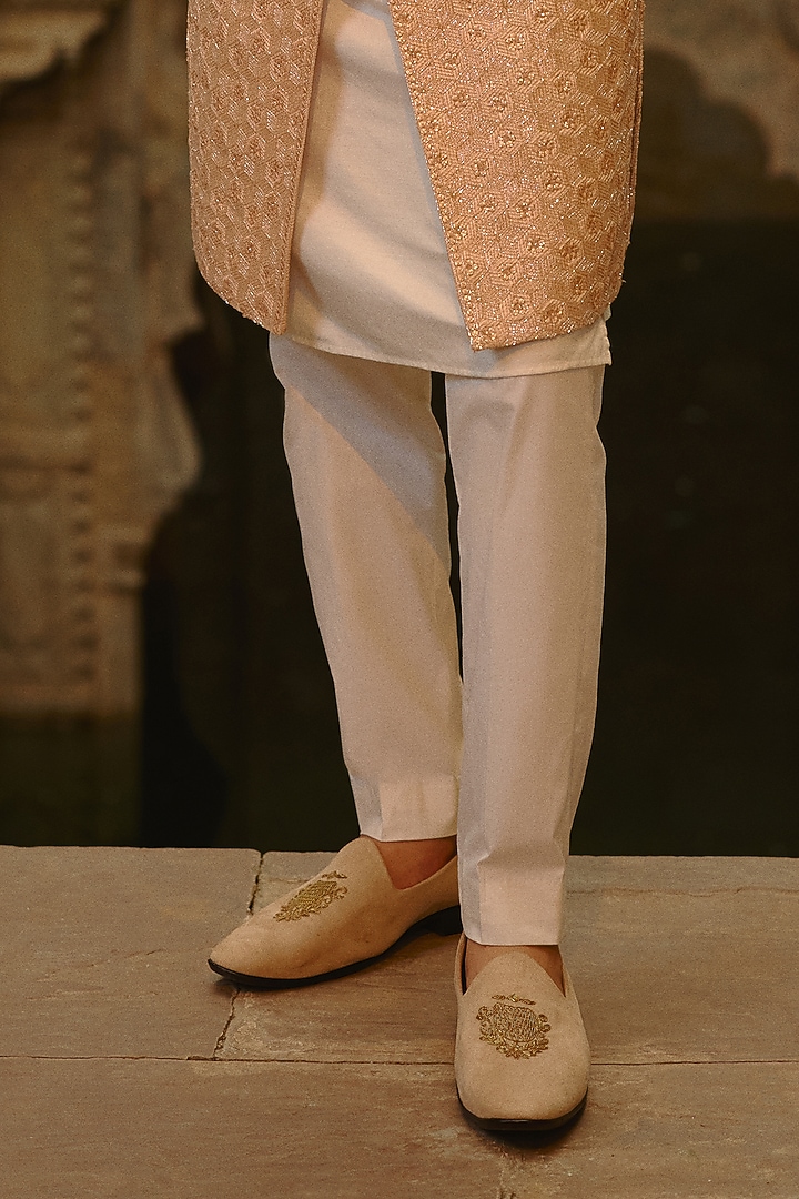 Peach Raw Silk Cutdana Embroidered Groom Sherwani Set by NITIKA GUJRAL MEN at Pernia's Pop Up Shop