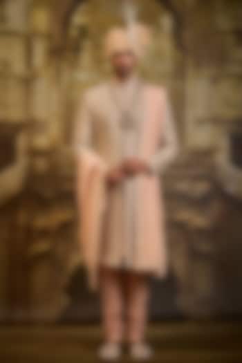 Peach Woven Brocade Dabka Embroidered Sherwani Set by NITIKA GUJRAL MEN