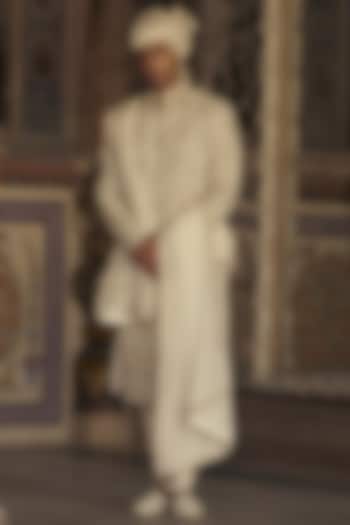 Ivory & Beige Raw Silk Resham Embroidered Groom Sherwani Set by NITIKA GUJRAL MEN at Pernia's Pop Up Shop