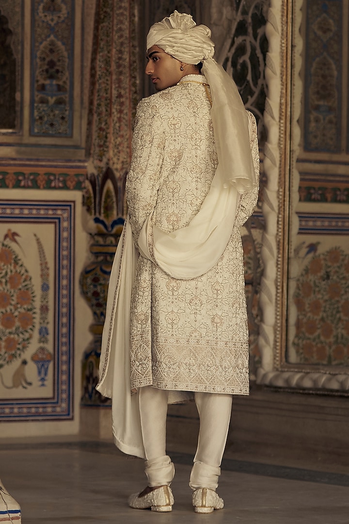 Ivory & Beige Raw Silk Resham Embroidered Groom Sherwani Set by NITIKA GUJRAL MEN at Pernia's Pop Up Shop