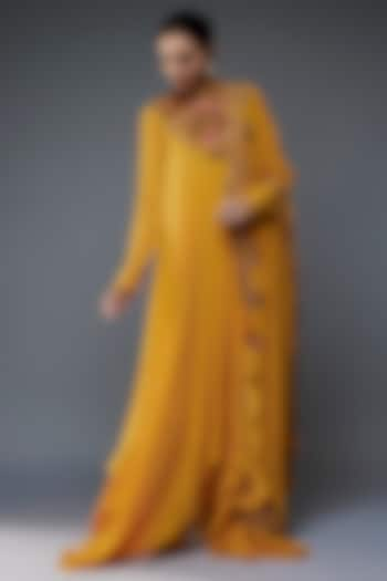 Pumpkin Yellow Chiffon Floral Thread Embroidered Asymmetrical Kurta Set by Nakul Sen at Pernia's Pop Up Shop