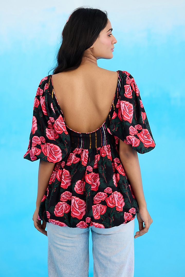 Black Modal Satin Rose Printed Peplum Top by Nikasha at Pernia's Pop Up Shop