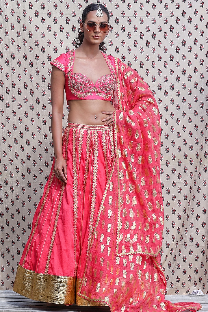 Coral Red Hand Embroidered Wedding Lehenga Set by Nikasha at Pernia's Pop Up Shop