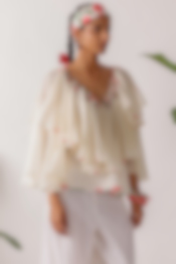 Cream Cotton Mulmul Embroidered Ruffled Top by Nikasha at Pernia's Pop Up Shop
