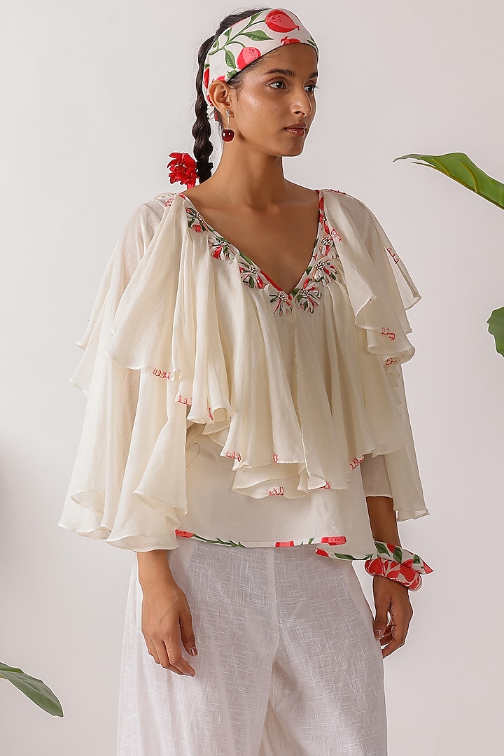 Cream Cotton Mulmul Embroidered Ruffled Top by Nikasha at Pernia's Pop Up Shop
