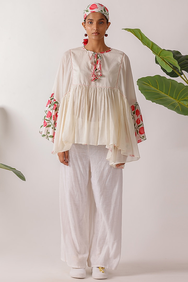 Ivory Cotton Mulmul Hand Embroidered & Printed Top by Nikasha at Pernia's Pop Up Shop