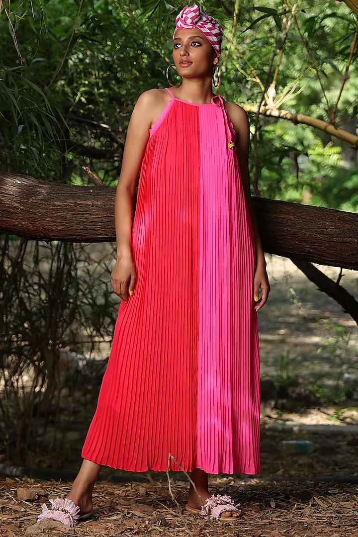 Gajjari Coral & Mithai Pink Georgette Pleated Halter Dress by Nikasha