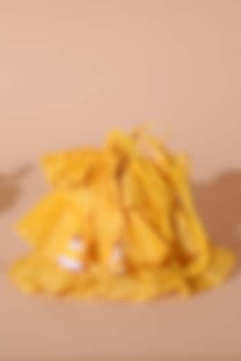 Yellow Chanderi Tiered Potli Bag by Nikasha at Pernia's Pop Up Shop