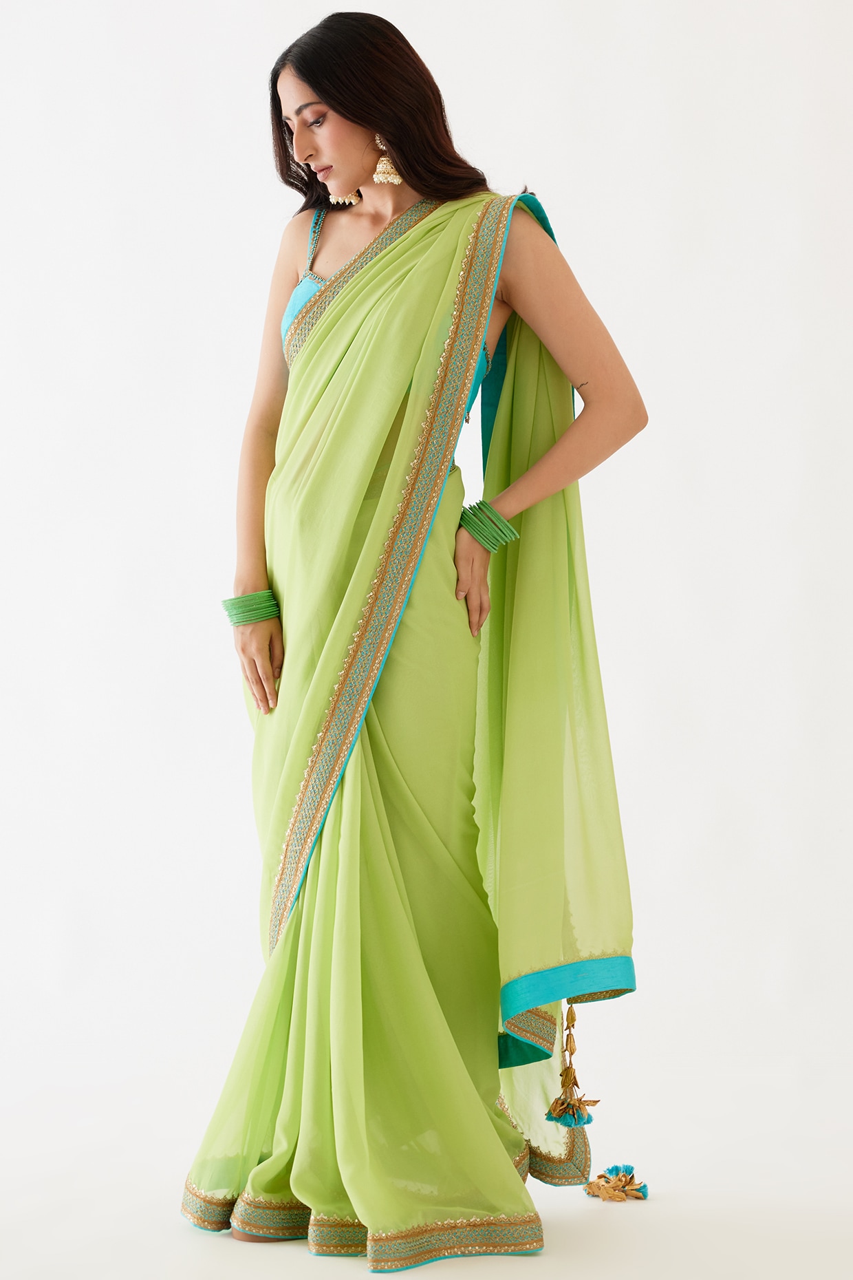 Pista green color soft linen silk saree with zari weaving work