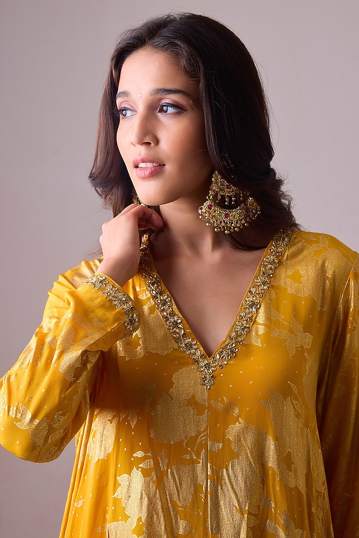 Haldi Yellow Pure Crepe Silk Foil Printed Asymmetric Kurta Set by Nikasha at Pernia's Pop Up Shop