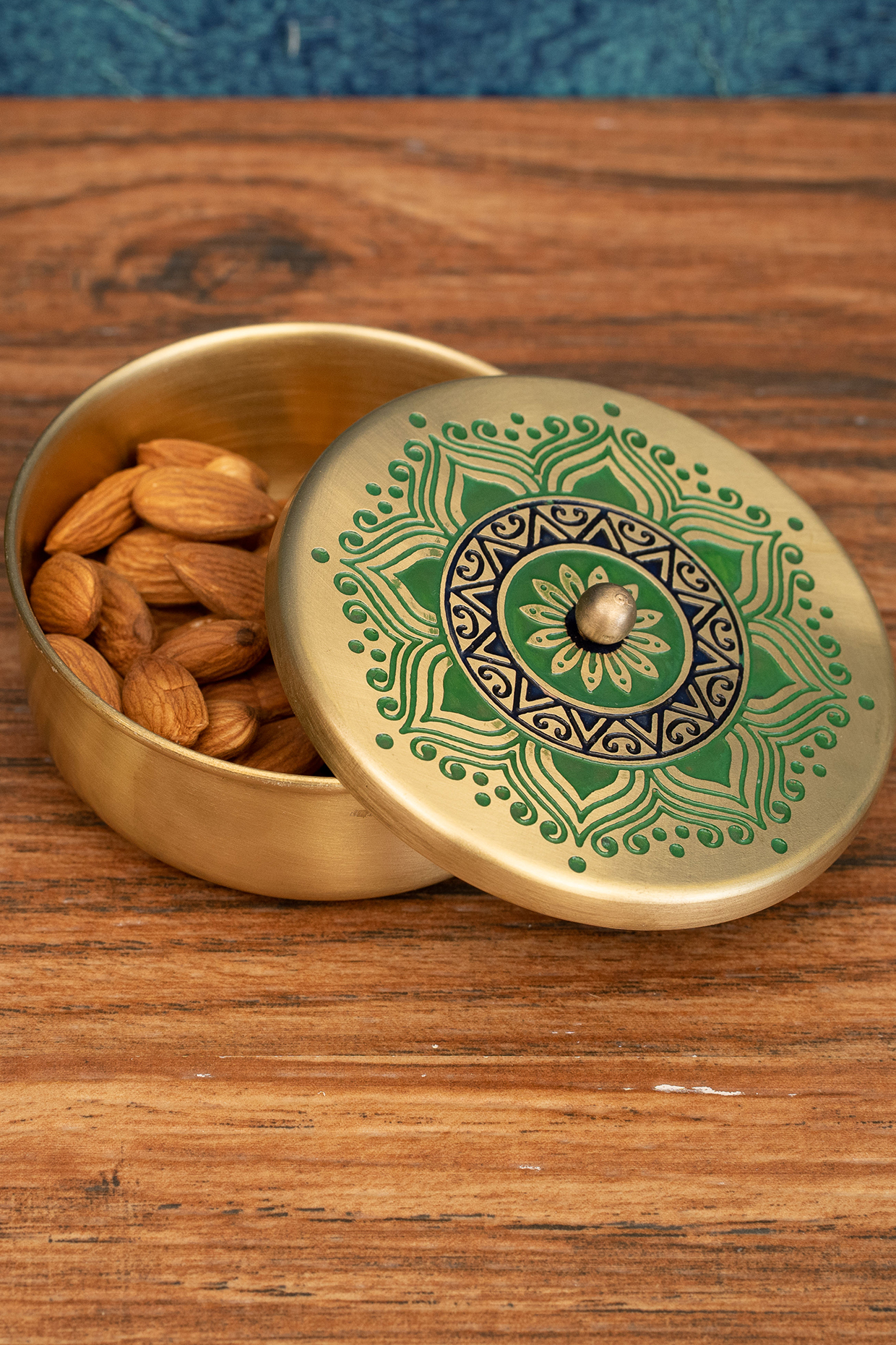 Peacock Green Utsav Brass Nut Bowl by Nakshikathaa at Pernia's Pop Up Shop