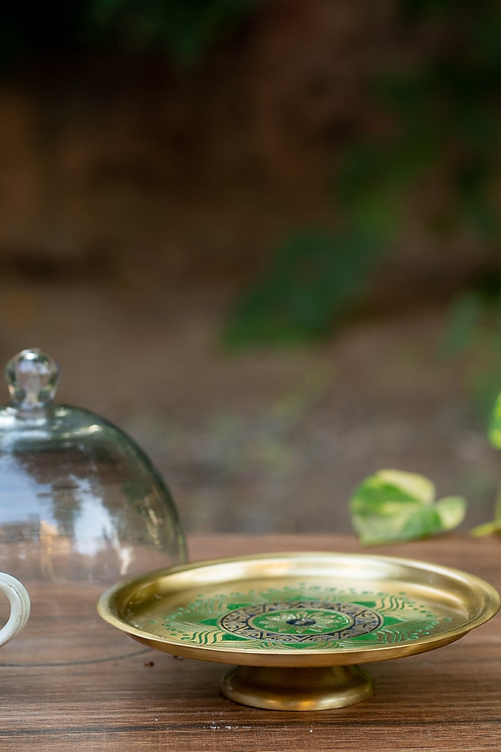 Peacock Green Utsav Brass Cake Stand With Glass Cloche by Nakshikathaa at Pernia's Pop Up Shop