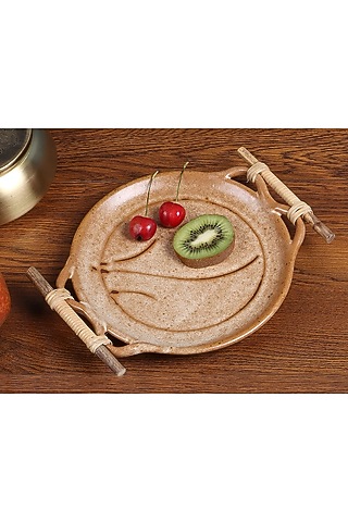 Beige Studio Pottery Round Platter With Cane Handle by Nakshikathaa