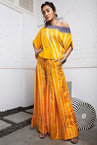 Mustard Bandhani Box Pleated Pants With Dyed Top by Nupur Kanoi
