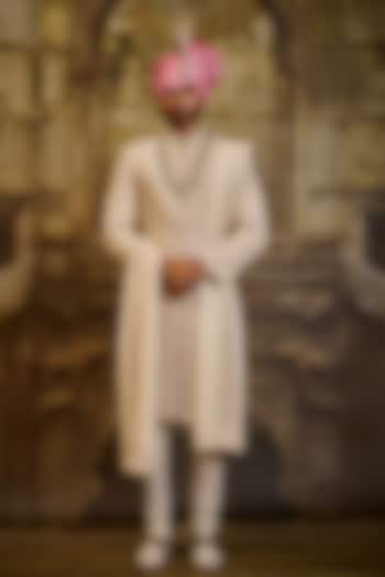 Ivory Raw Silk & Cotton Silk Cutdana Embroidered Groom Sherwani Set by NITIKA GUJRAL MEN at Pernia's Pop Up Shop