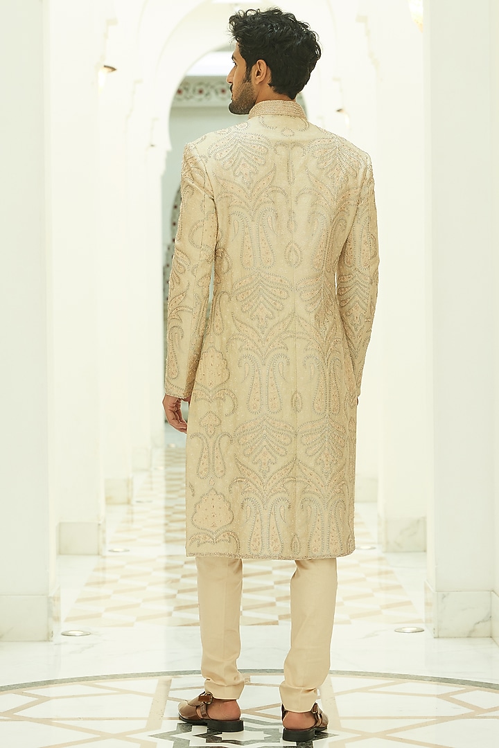 Beige Raw Silk Silver Beads Embroidered Groom Sherwani Set by NITIKA GUJRAL MEN at Pernia's Pop Up Shop
