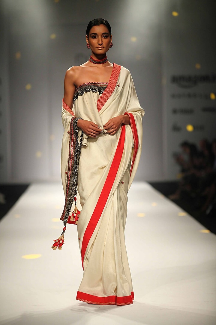 Ivory katha and bead embroidered border saree with ivory khadi ruffled blouse available only at Pernia's Pop Up Shop.