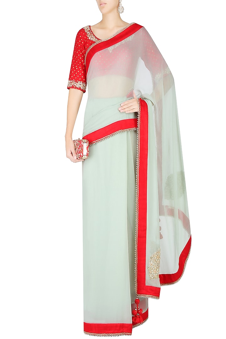 Mint and red saree with red embroidered print blouse available only at Pernia's Pop Up Shop.
