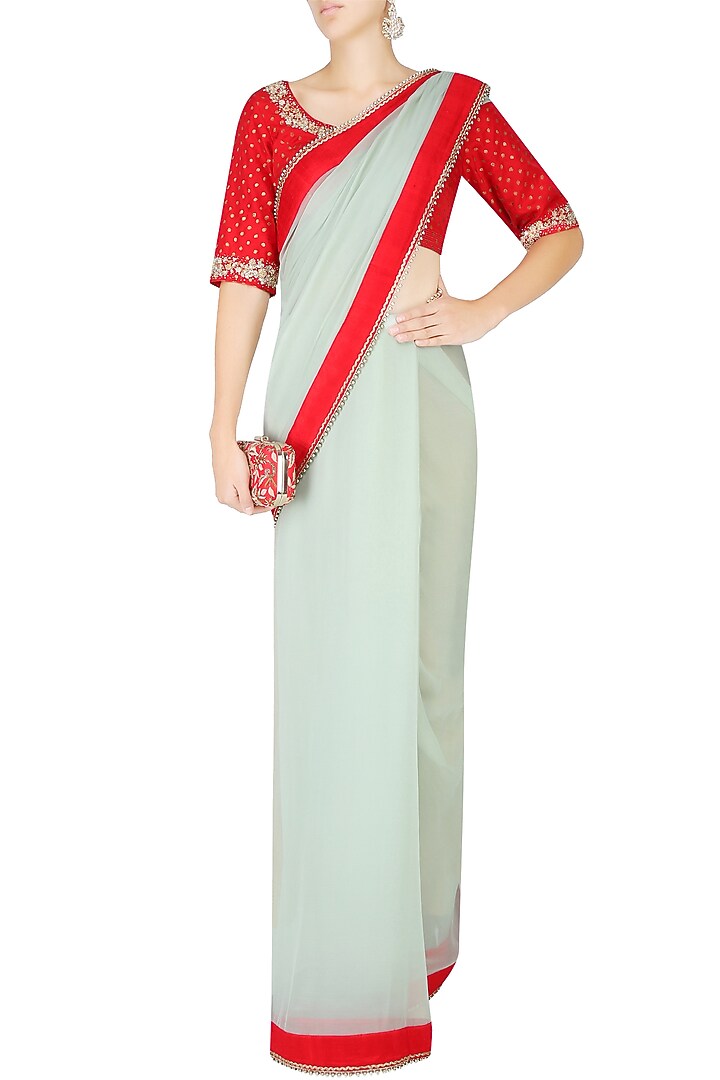 Mint and red saree with red embroidered print blouse available only at Pernia's Pop Up Shop.