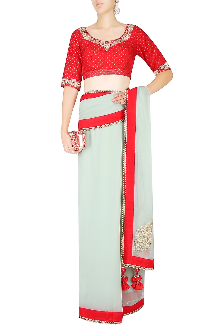 Mint and red saree with red embroidered print blouse available only at Pernia's Pop Up Shop.