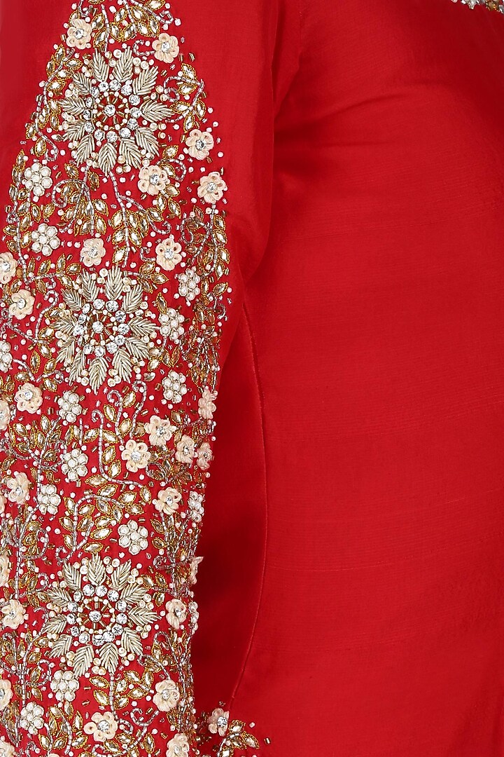 Mustard embroidered kurta with double layered shararas and orange dupatta available only at Pernia's Pop Up Shop.
