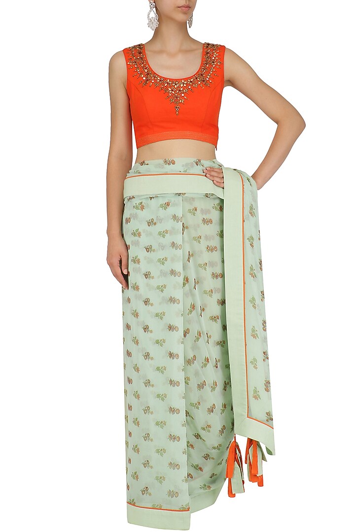 Blue floral print saree with orange embroidered blouse available only at Pernia's Pop Up Shop.