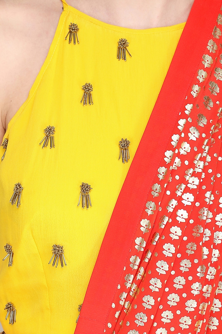 Yellow embroidered crop top with cowl dhoti pants available only at Pernia's Pop Up Shop.