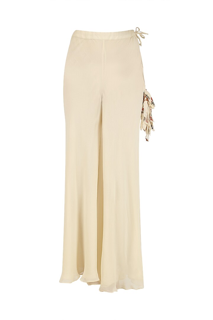 Cream embroidered peplum top and pants set
