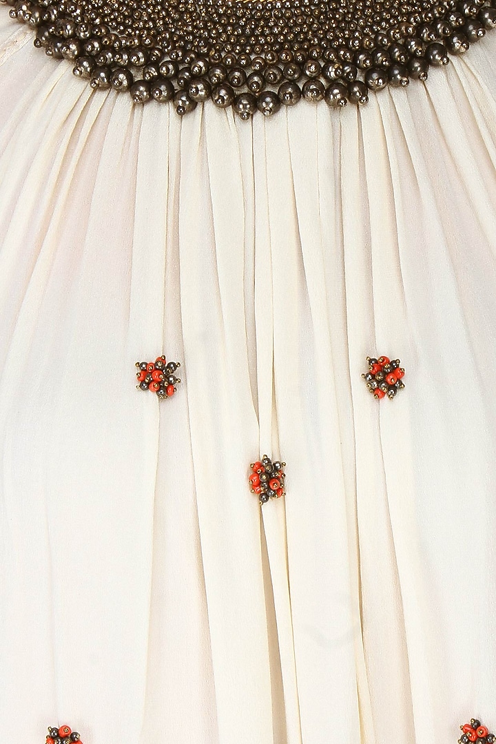 Ivory kurlong rouching bead embroidery kurta with gathered sharara pants available only at Pernia's Pop Up Shop.