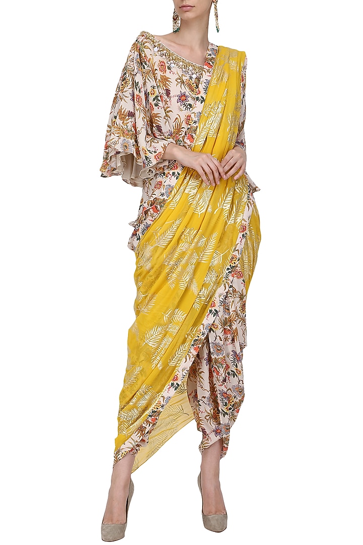 Ivory floral hand painted blouse and dhoti pants with yellow embroidered dupatta available only at Pernia's Pop Up Shop.