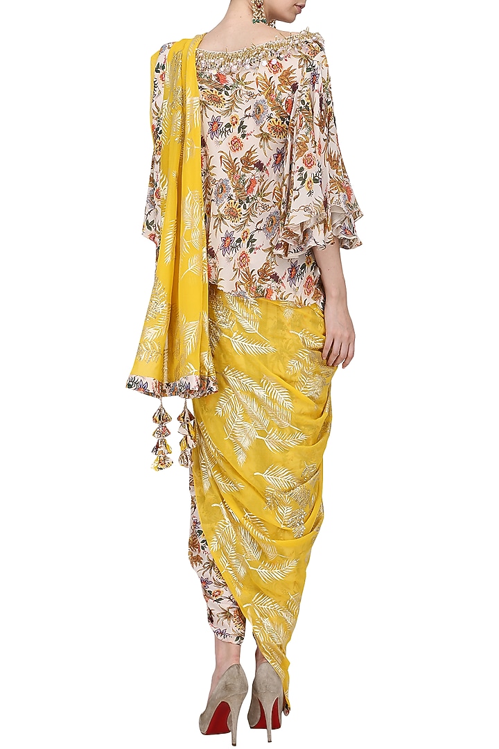 Ivory floral hand painted blouse and dhoti pants with yellow embroidered dupatta available only at Pernia's Pop Up Shop.