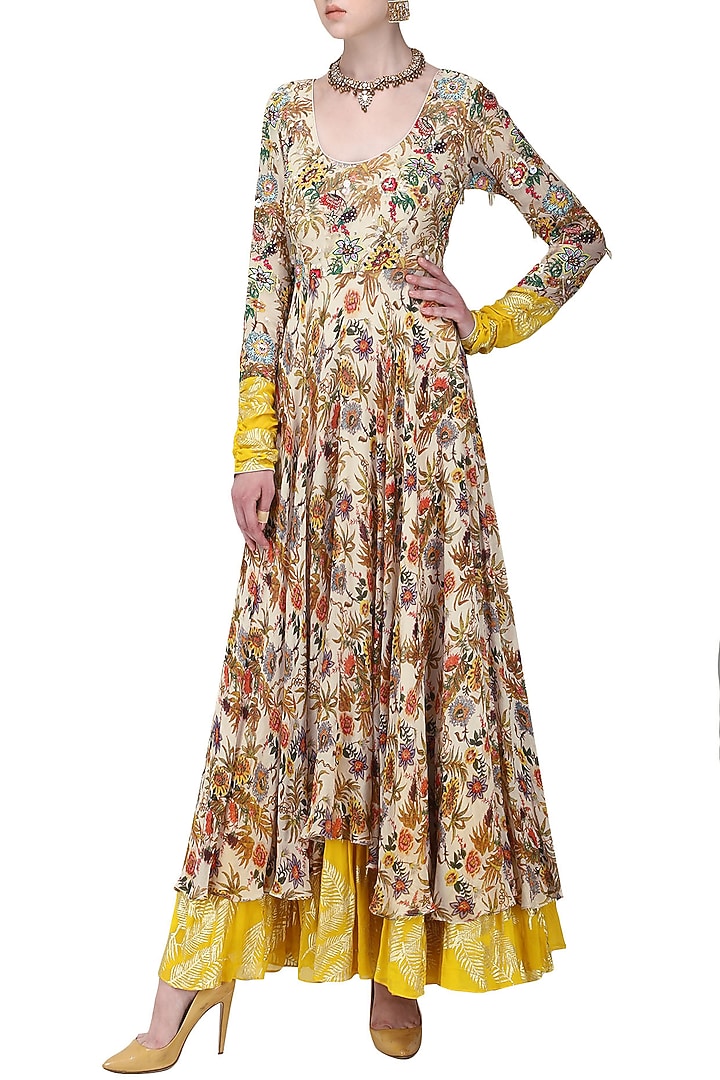 Ivory and yellow embroidered and hand painted anarkali with churidar pants available only at Pernia's Pop Up Shop.