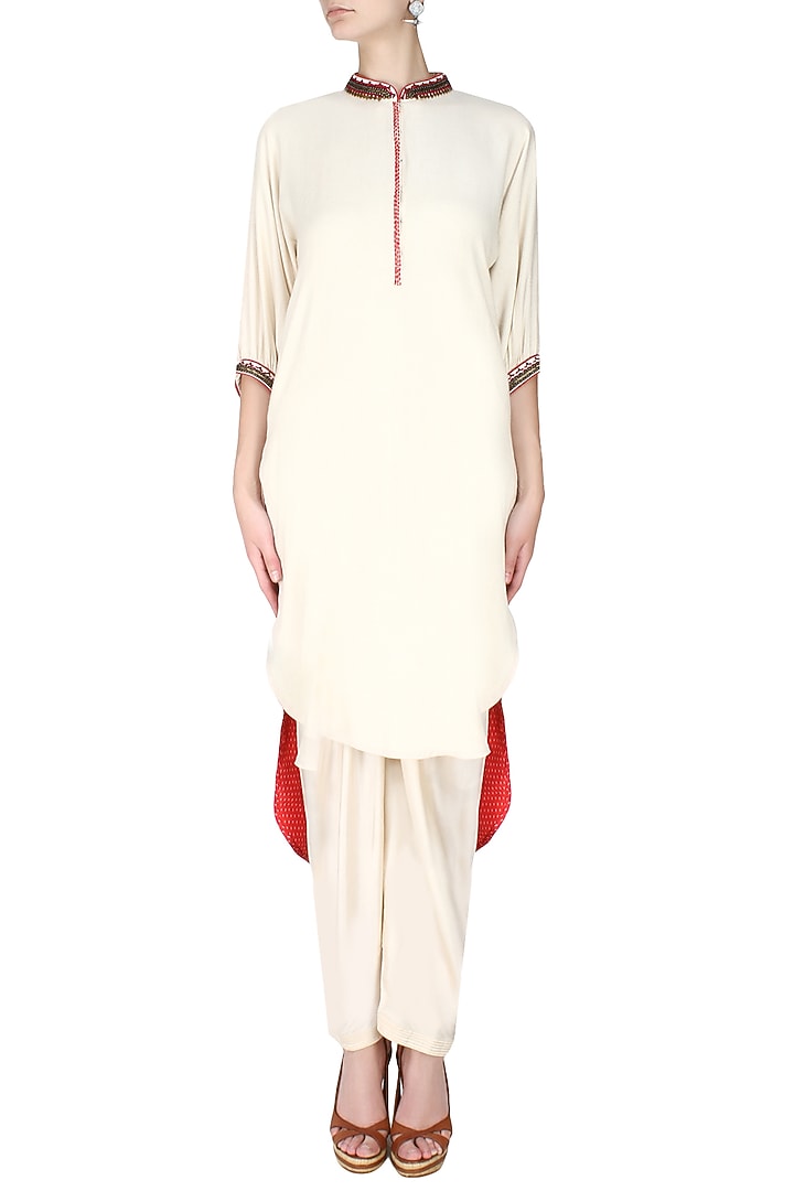 Cream embroidered high low printed kurta with dhoti pants available only at Pernia's Pop Up Shop.