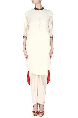 Cream Embroidered High Low Printed Kurta with Dhoti Pants by Nikasha