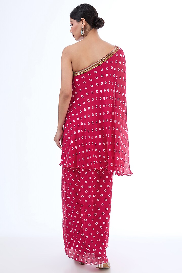 Rani Pink Viscose Georgette & Cotton Bandhani Printed One-Shoulder Double Layered Vacation Dress by Nikasha at Pernia's Pop Up Shop