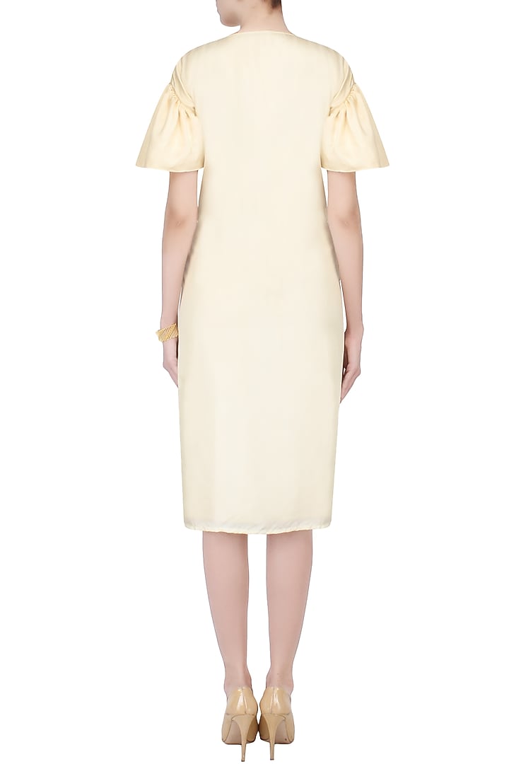 Cream and gold embroidered knee length shift dress available only at Pernia's Pop Up Shop.