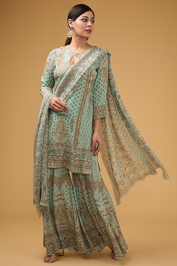 Green Crepe Printed & Embroidered Kurta Set by NIRRAAMYAA