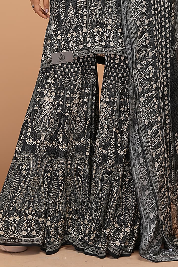 Black Crepe Digital Printed & Rhinestone Embroidered Party Wear Sharara Set by NIRRAAMYAA at Pernia's Pop Up Shop