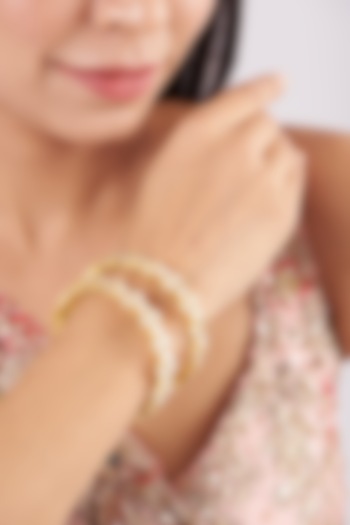 Micro Gold Finish Kundan Polki Bangles (Set of 2) by Namasya at Pernia's Pop Up Shop