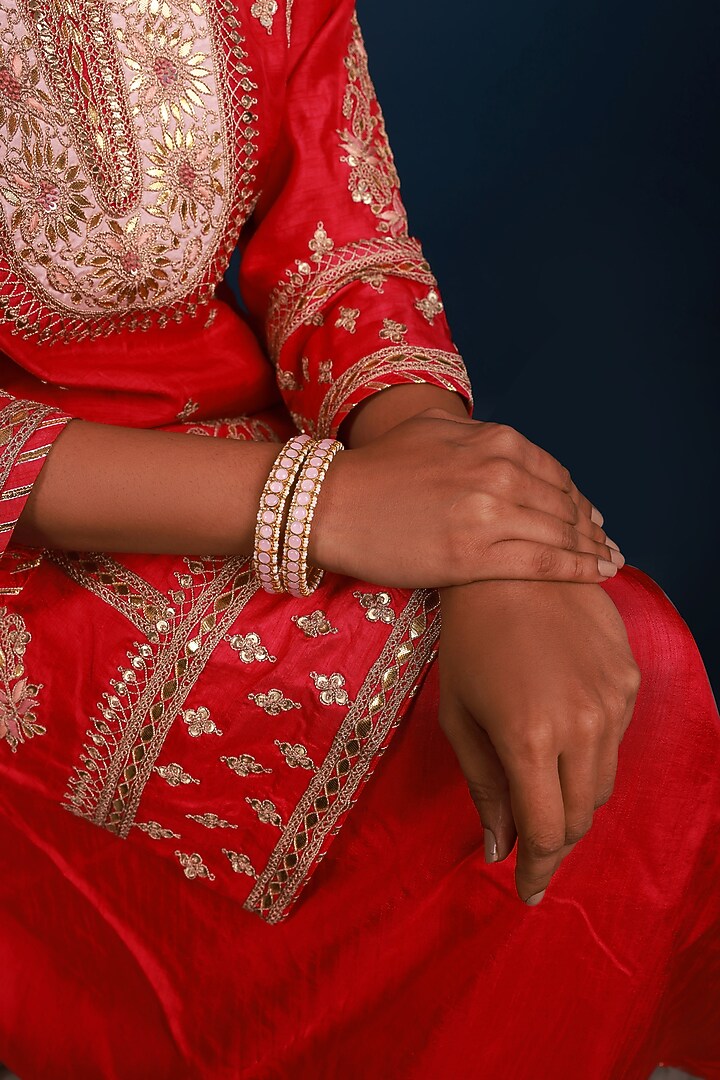 Gold Finish Kundan Polki & Pearl Bangles (Set of 2) by Namasya at Pernia's Pop Up Shop