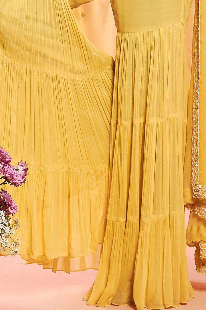 Daisy Yellow Tiered Wedding Sharara Set With Cape by NIAMH by Kriti at Pernia's Pop Up Shop