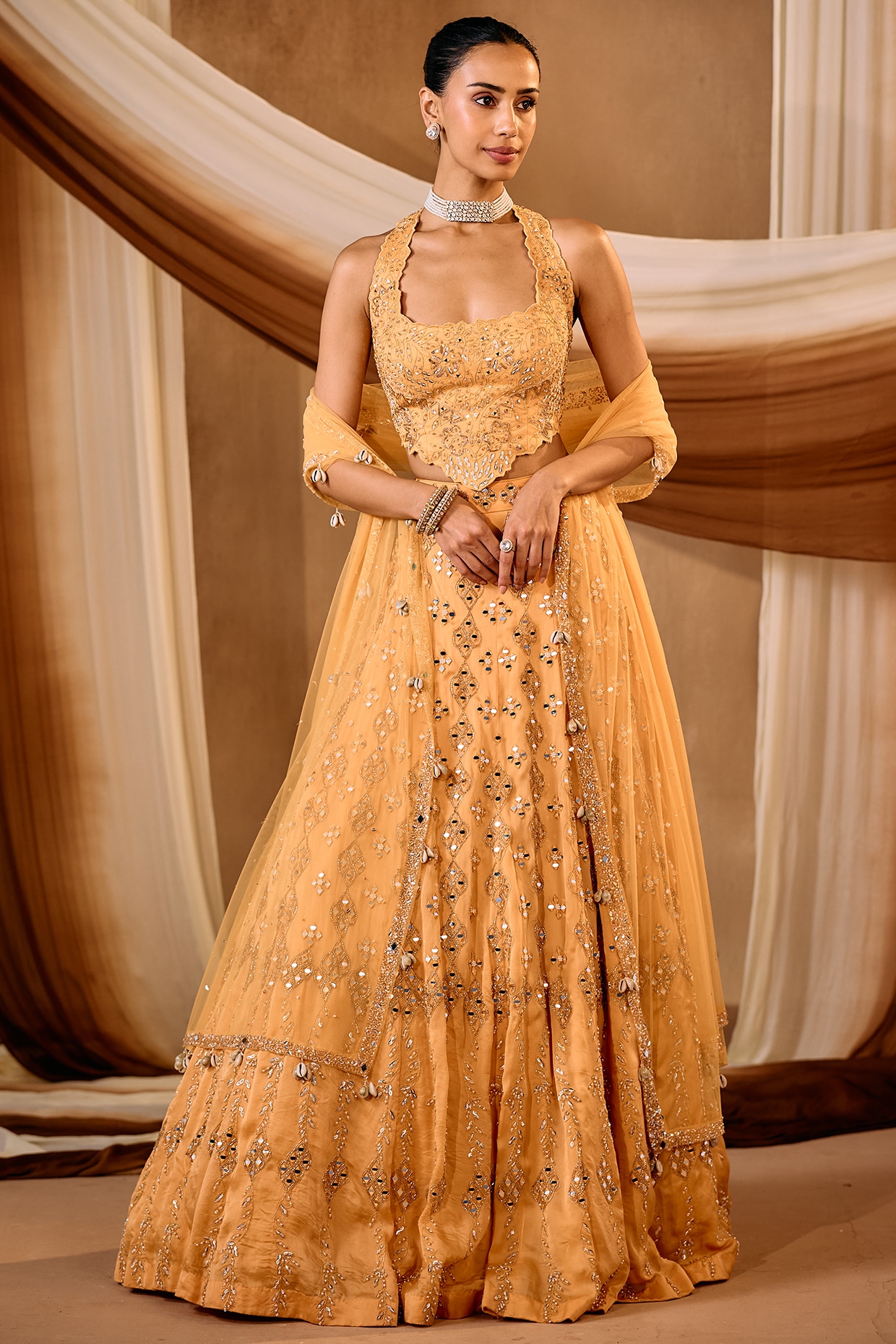 NIAMH by Kriti Light Orange Satin Organza Mirror Work Lehenga Set