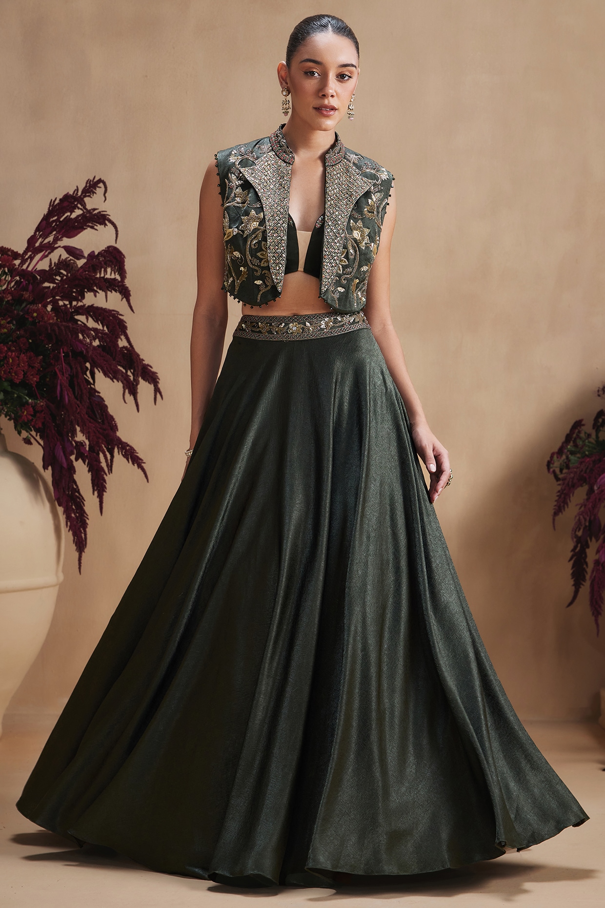 NIAMH by Kriti Deep Emerald Green Textured Silk Satin Jacket Lehenga Set