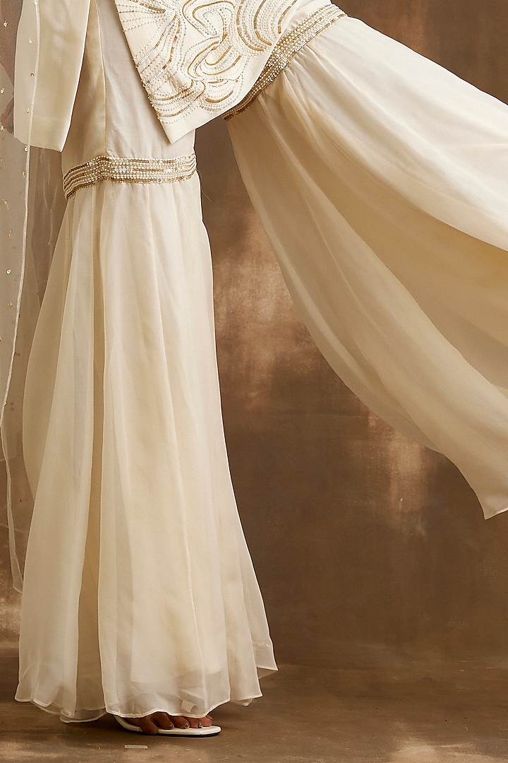 Ivory Silk Crepe & Organza Hand Embroidered Gharara Set by NIAMH by Kriti at Pernia's Pop Up Shop